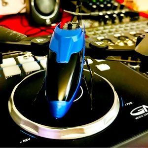 A blue four-axis Unmanned Helicopter With WIFI Camera.